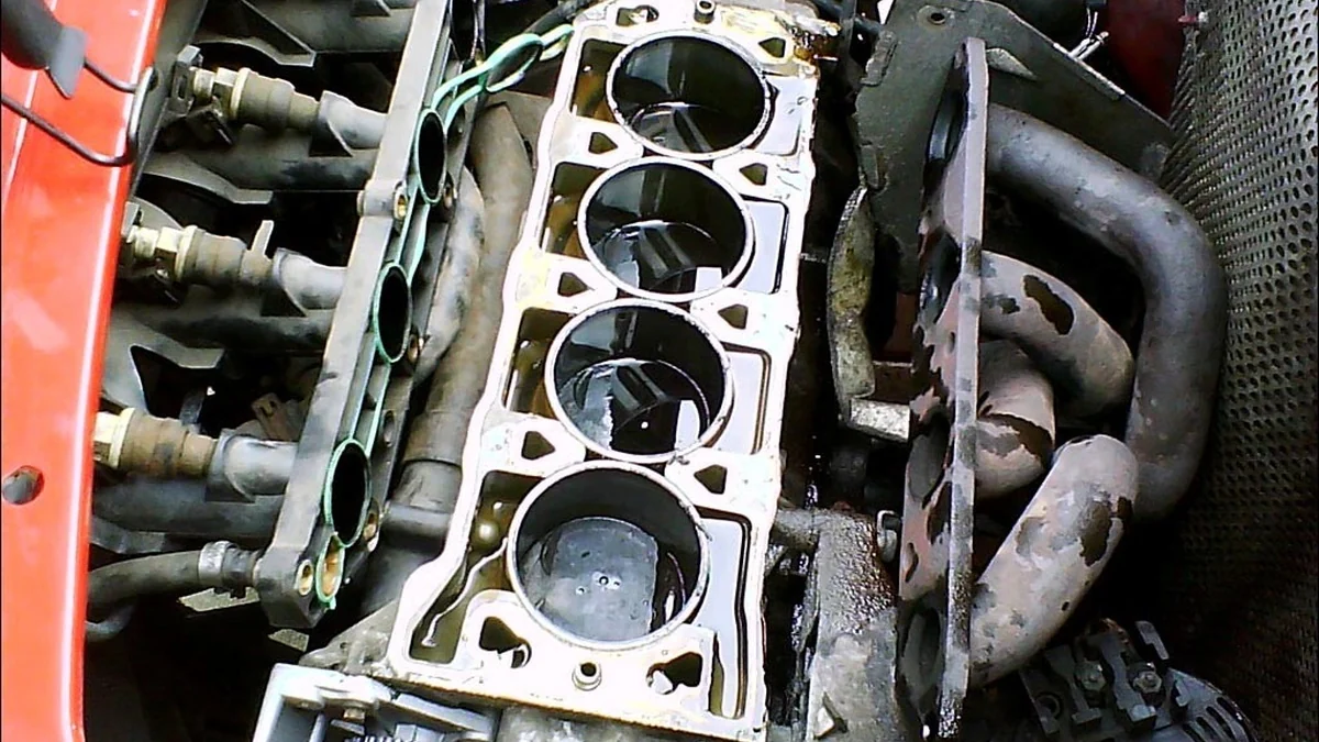 Rover K18 engine block with the cylinder head removed and four cylinder bores exposed